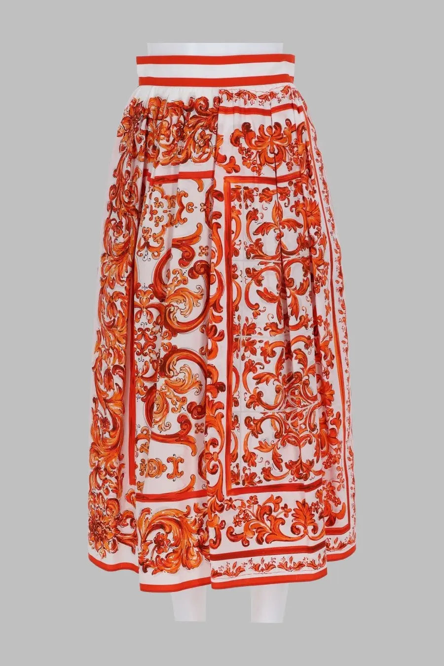 Dolce &amp; Gabbana women’s orange and white popeline pleated midi skirt with baroque pattern and bold red borders