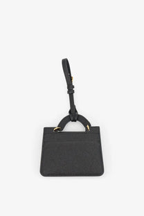 Black textured leather luggage tag with gold-tone hardware and looped handle for Dolce &amp; Gabbana women’s card holder