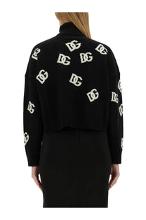 Black knitted cropped cardigan with high turtleneck and white dg logos on the back by dolce and gabbana
