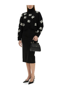Dolce &amp; Gabbana women’s black leather handbag with gold-tone hardware and small logo plaque on front flap