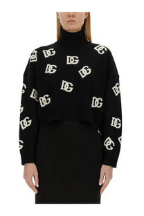 Dolce &amp; Gabbana women’s black jersey turtleneck sweater with white interlocking DG logo pattern