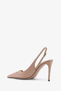 Dolce &amp; Gabbana women’s beige leather slingback pump with gold-tone buckle and slender high heel