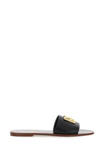 Dolce &amp; Gabbana women’s black leather slide sandal with gold-tone logo plaque on the upper strap