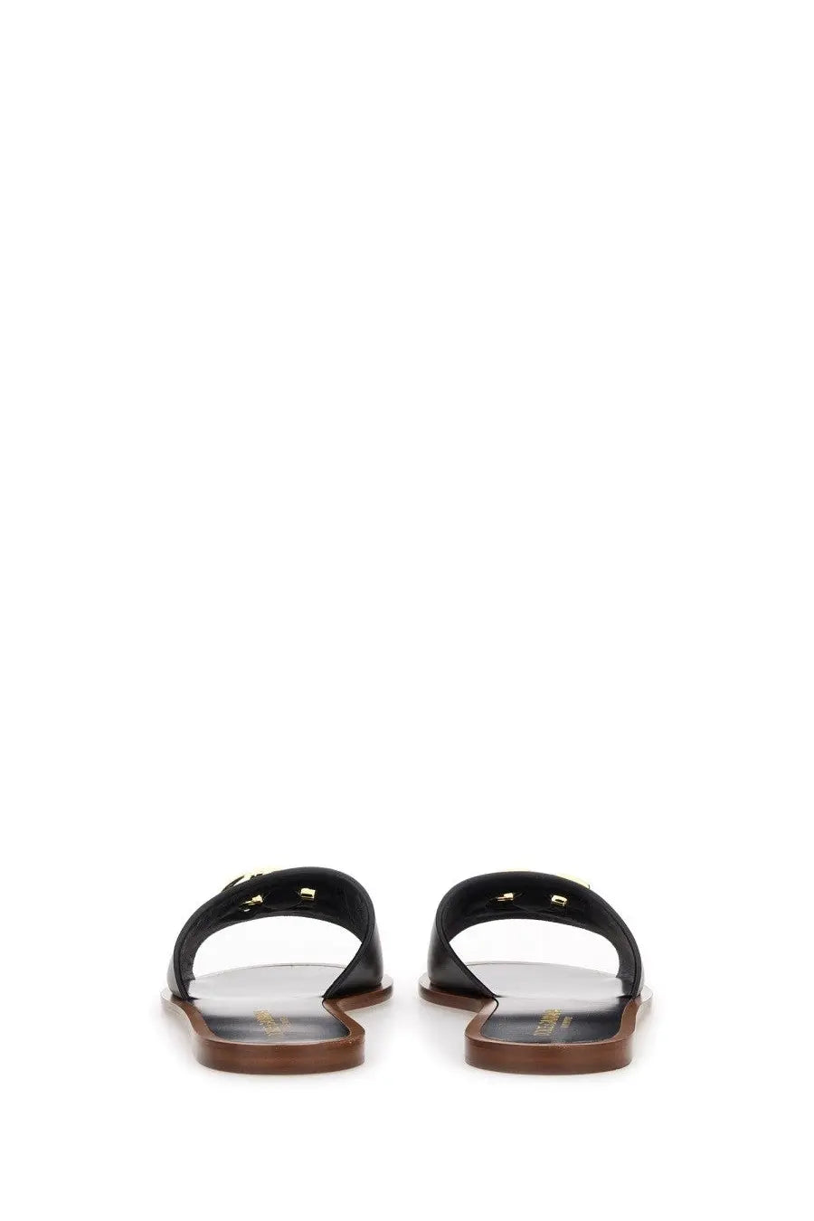 Dolce &amp; Gabbana women’s black leather slide sandal with gold-tone hardware and brown rubber sole