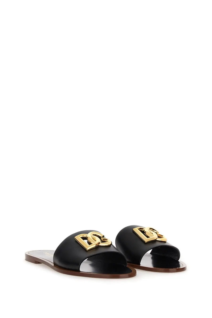 Dolce &amp; Gabbana women’s black leather slide sandal featuring a gold-tone d&amp;g logo emblem on the front