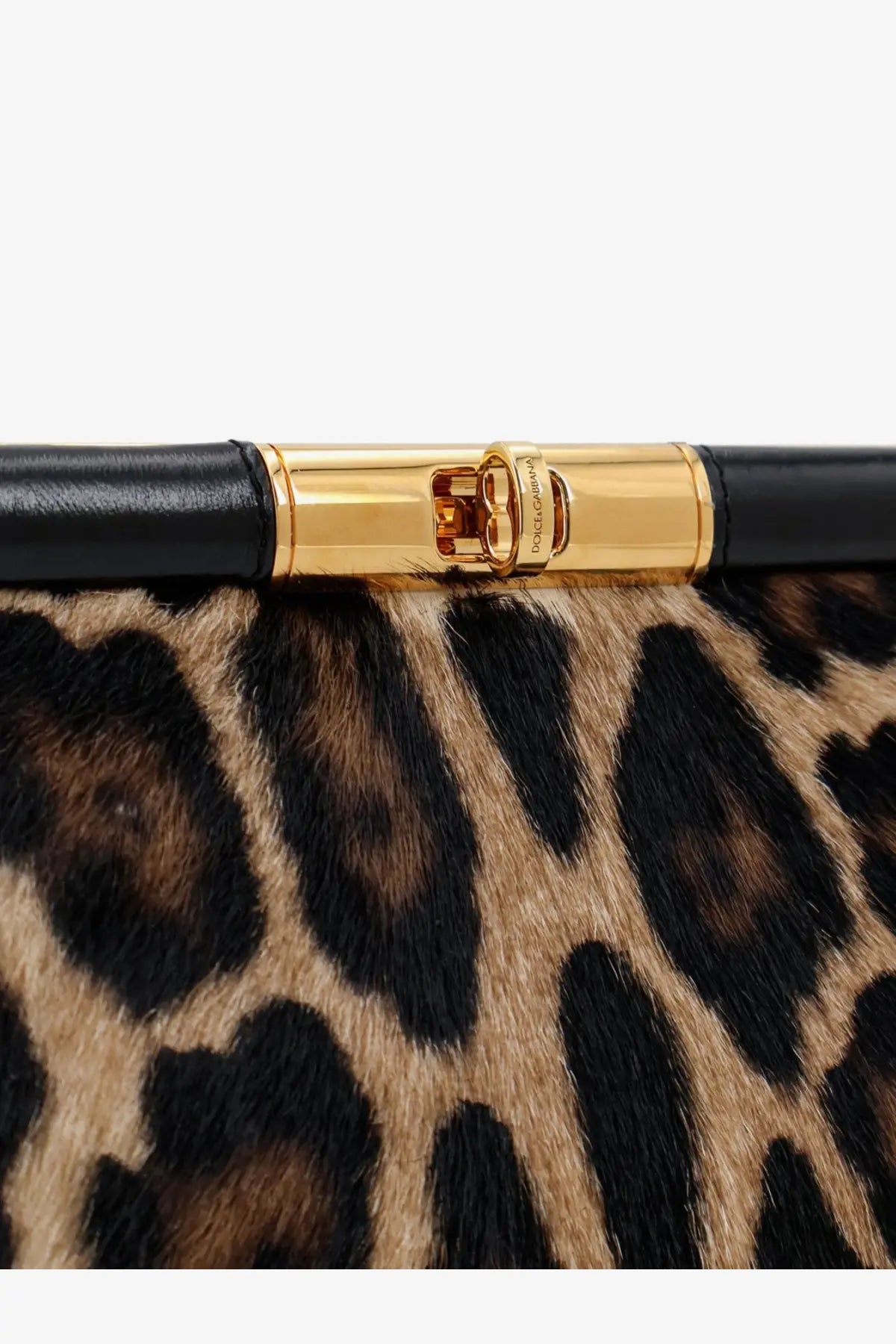 Dolce &amp; Gabbana women’s marlene shoulder bag in black and gold leopard print pony skin with polished metal clasp