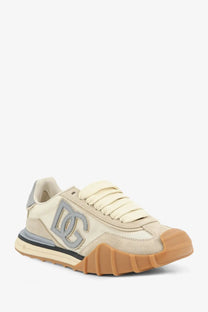Dolce &amp; gabbana women’s cream suede sneaker with gray dc logo tan rubber sole and black accent stripe