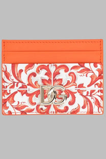 Dolce &amp; Gabbana women’s orange leather portacarte card holder with vibrant floral pattern and metallic DG logo clasp