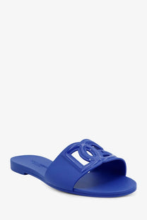 Dolce &amp; Gabbana women’s bright blue pvc slide sandal with glossy embossed logo on foot strap