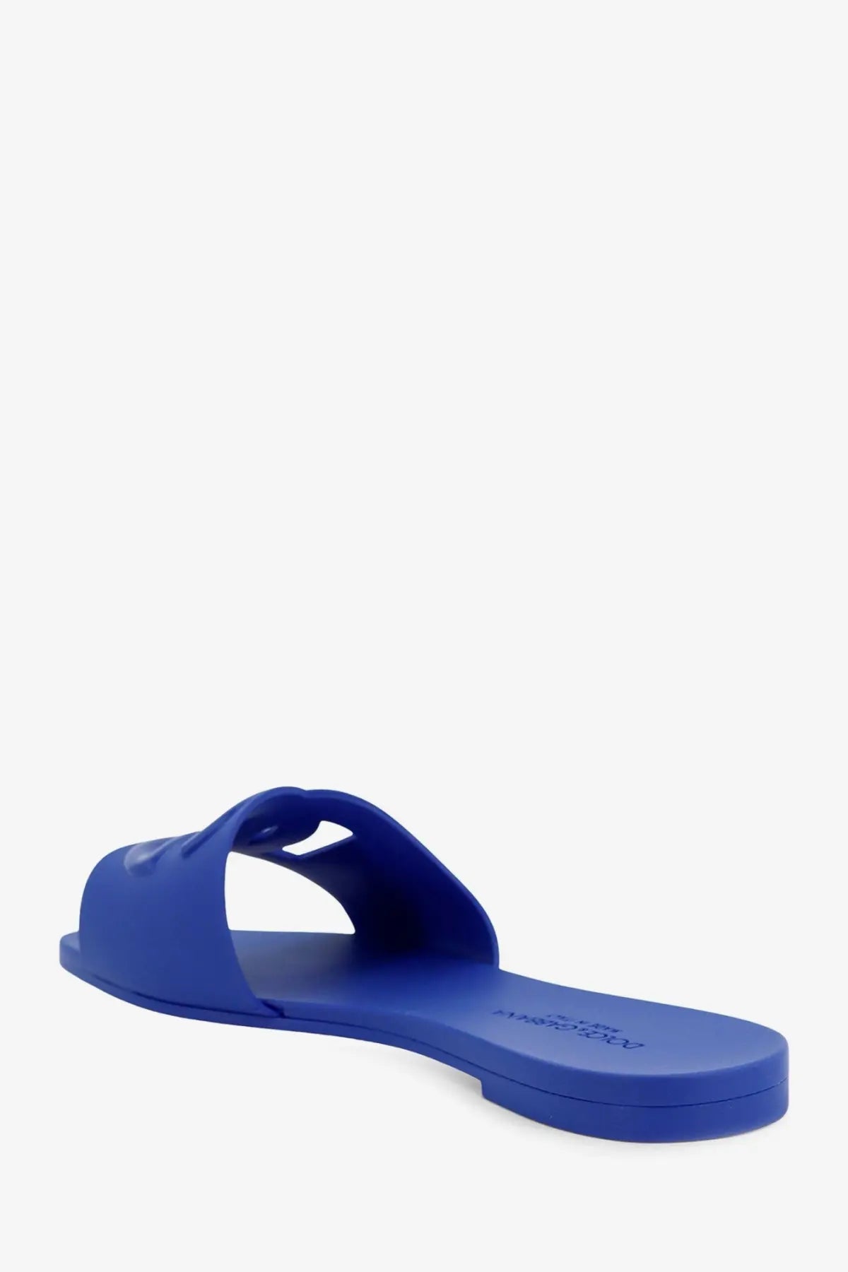 Dolce &amp; Gabbana women’s royal blue rubber slide sandal with minimalist design and embossed logo on the insole