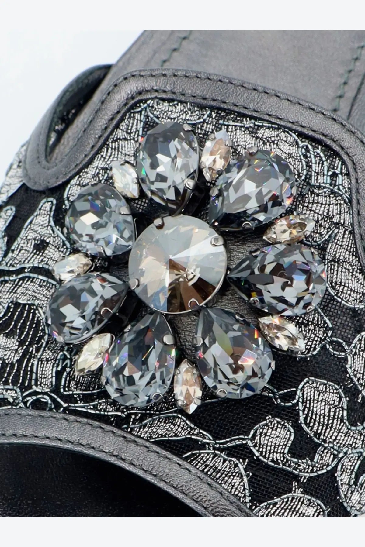 Black leather clutch with a sparkling silver crystal flower brooch and dolce and gabbana women’s blue rainbow lace sandals