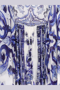 Dolce &amp; Gabbana women’s silk long dress in white with blue and purple floral ceramic tile patterns
