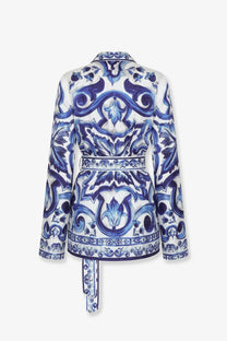 Dolce &amp; gabbana women’s blue silk shirt featuring a white and blue patterned blazer with intricate ornamental design