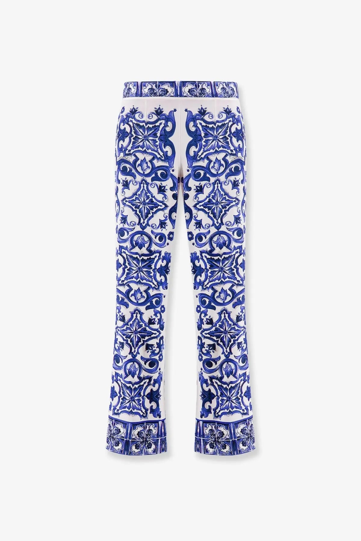 Dolce &amp; Gabbana women’s silk trousers in white with intricate blue ceramic tile pattern and symmetrical designs