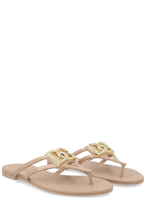 Beige rubber flip-flops with gold-tone interlocking cc logo clasp for women by Dolce &amp; Gabbana slides
