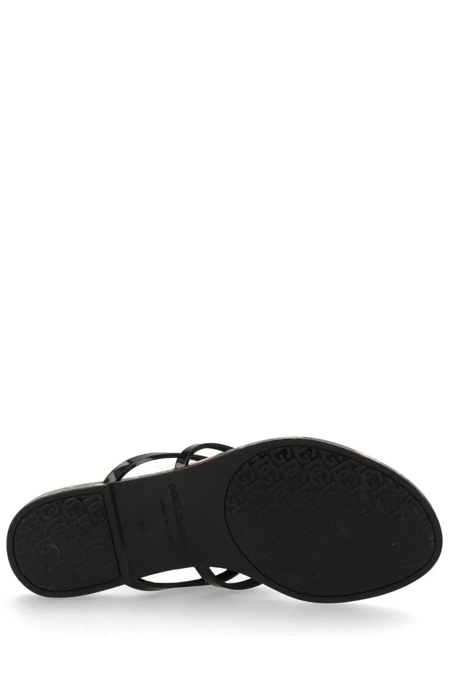 Dolce &amp; Gabbana women’s slide with black leather strap, sleek minimalist design, and embossed logo on the sole