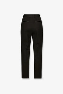 Dolce &amp; Gabbana women’s black tuxedo trousers in virgin wool and silk with sleek straight-leg cut and subtle back pockets shown from back