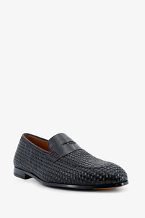 Doucal’s men’s Braidy black leather loafer with woven texture and smooth patent leather strap across the toe