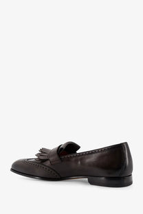 Doucal’s men’s decò dark brown leather loafers with tassel detail and brogue perforations in gold