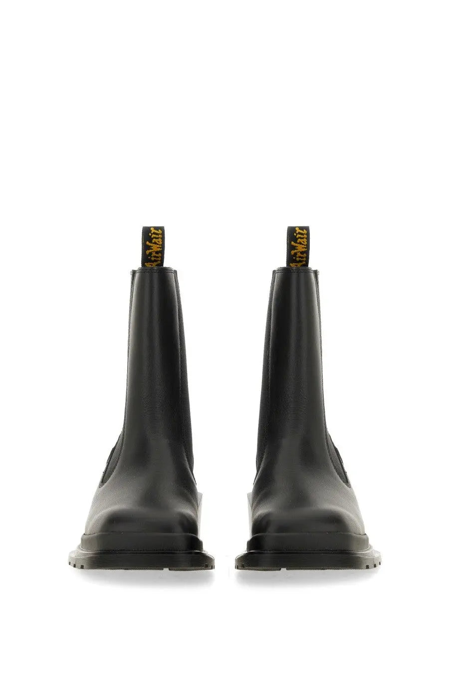 Black dr martens women’s maybole chelsea boot showing smooth leather and elastic side panels from the back