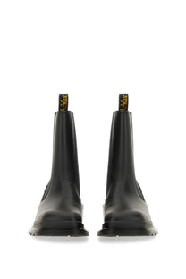 Black dr martens women’s maybole chelsea boot showing smooth leather and elastic side panels from the back