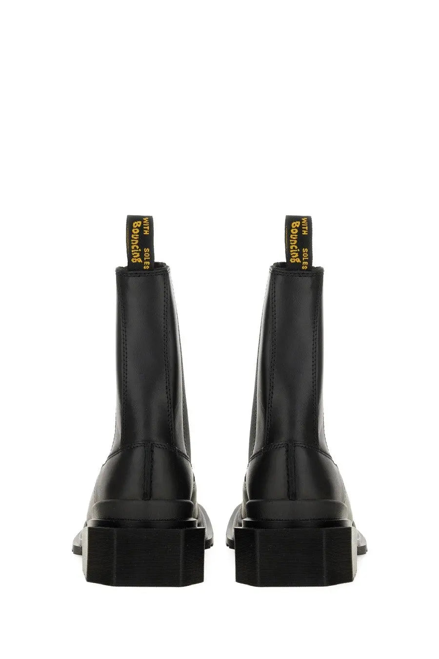 Dr Martens women’s maybole chelsea boot black leather with chunky platform soles and yellow stitching on heel tabs back view