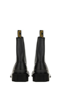 Dr Martens women’s maybole chelsea boot black leather with chunky platform soles and yellow stitching on heel tabs back view
