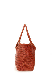 Dragon Diffusion women’s terracotta woven tote bag with herringbone pattern and braided handles in nantucket orange