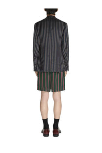 Dries Van Noten men’s blazer balto blue in dark gray and black striped fabric paired with green and red striped shorts