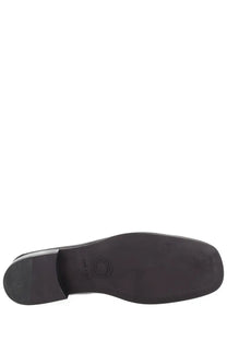 Black rubber sole with circular logo embossed near heel of dries van noten men’s mocassino in pelle black