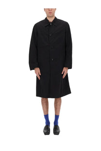 Black Dries Van Noten men’s trench coat with classic collar and button closure for stylish outerwear