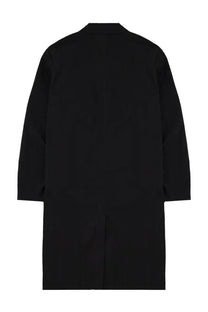 Black minimalist Dries Van Noten men’s rankles trench coat with sleek unadorned design front view