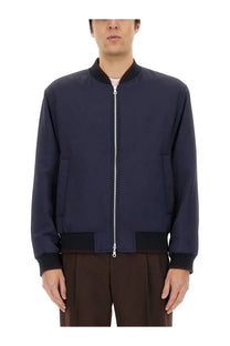 Navy blue Dries Van Noten men’s reversible bomber jacket with black ribbed cuffs waistband and silver zipper pull