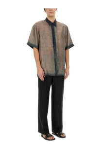 Dries Van Noten men’s silk short-sleeved shirt in muted brown with paisley pattern and dark green trim on collar and cuffs