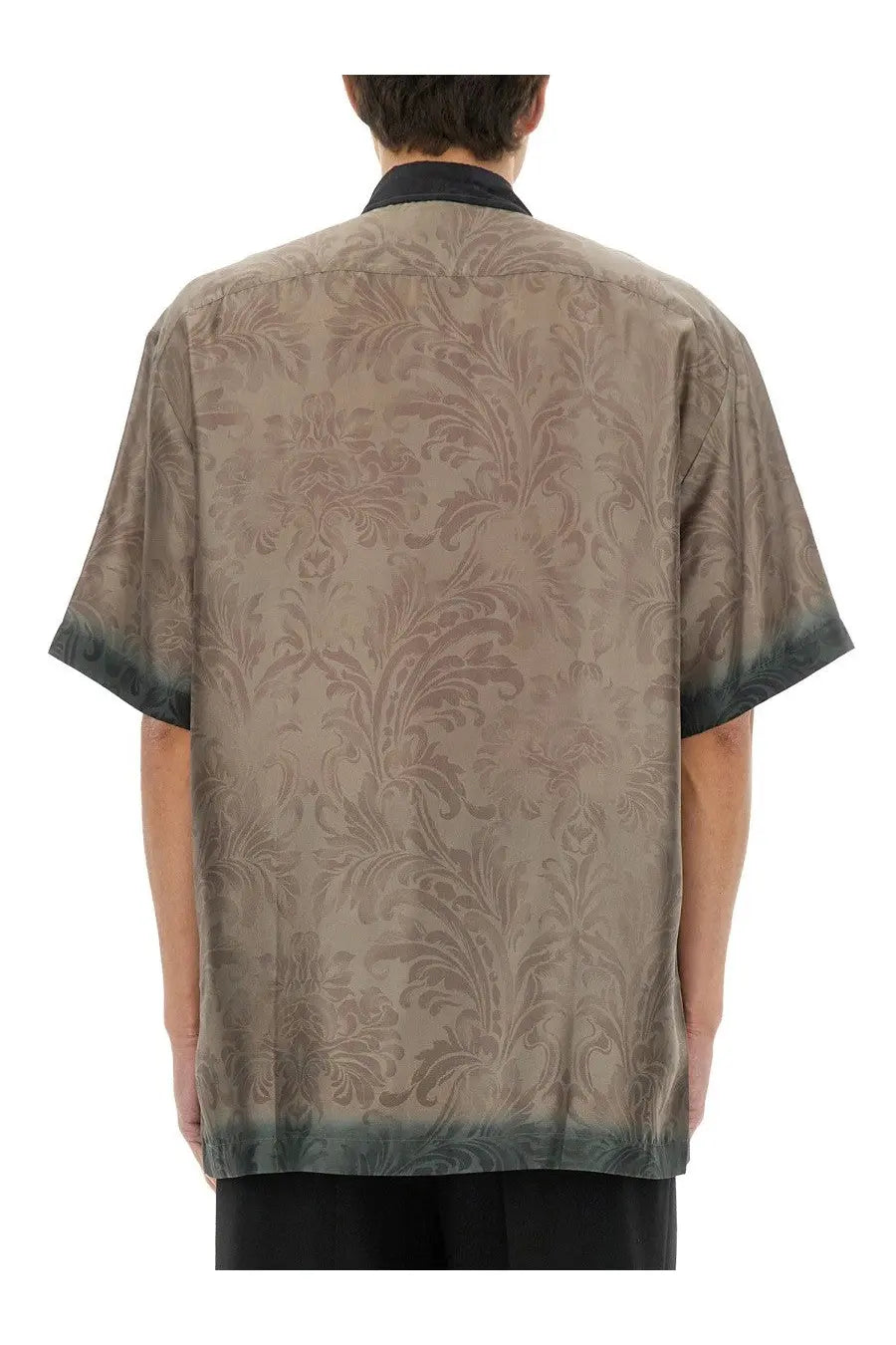 A taupe silk short-sleeved shirt with subtle damask pattern and dark green gradient trim by Dries Van Noten