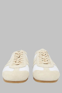 Cream and white low-top suede sneakers for men by dries van noten with classic design and premium materials