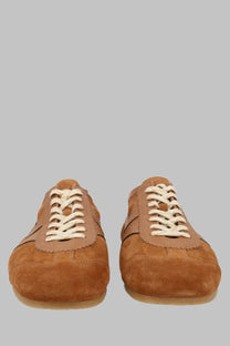 Dries Van Noten men’s low-top sneaker in tan suede with cream laces and subtle stitched design