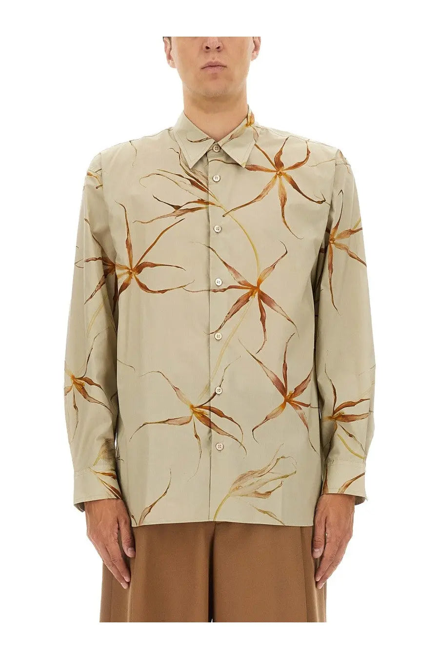 Beige long-sleeved button-up shirt with subtle warm brown and gold floral pattern by dries van noten