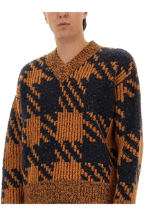 Dries Van Noten men’s wool jersey sweater with chunky knit bold geometric burnt orange and navy blue pattern