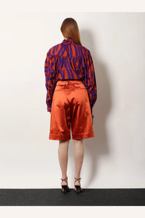 Dries Van Noten women’s brown cotton blend bermuda shorts with high waist and rolled cuffs in orange satin