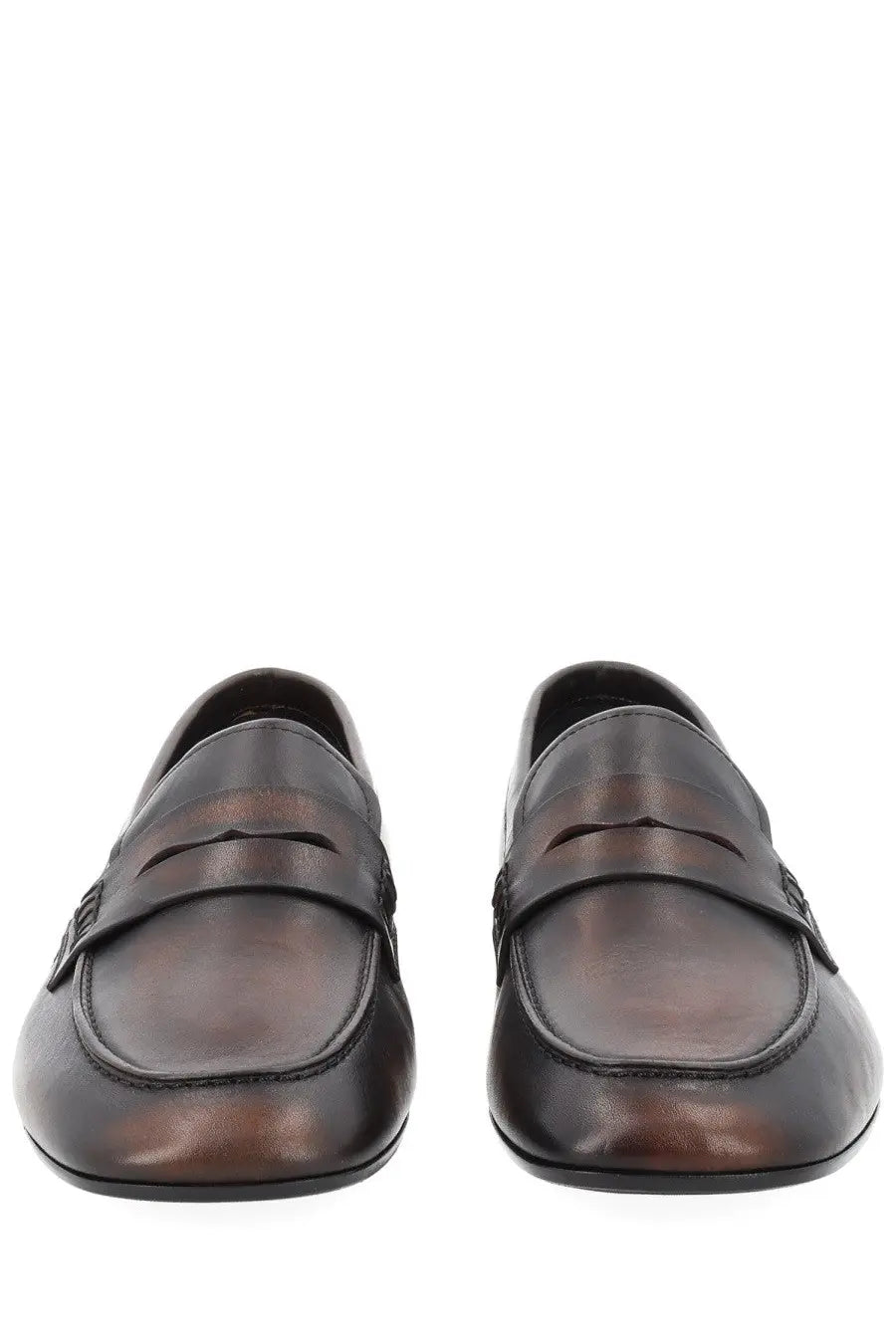 Dark brown leather penny loafers for women by Dries Van Noten with classic design and smooth finish