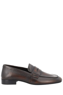 Dark brown leather loafer for women by Dries Van Noten with polished finish and subtle sheen