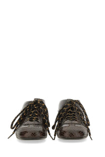 Dries van noten women’s leather slip on mules in brown with dark brown snake print and gold geometric patterns