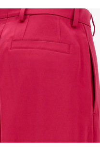 Bright fuchsia high-waisted Dries Van Noten women’s penn satin trousers with sleek tailored design and subtle pleats