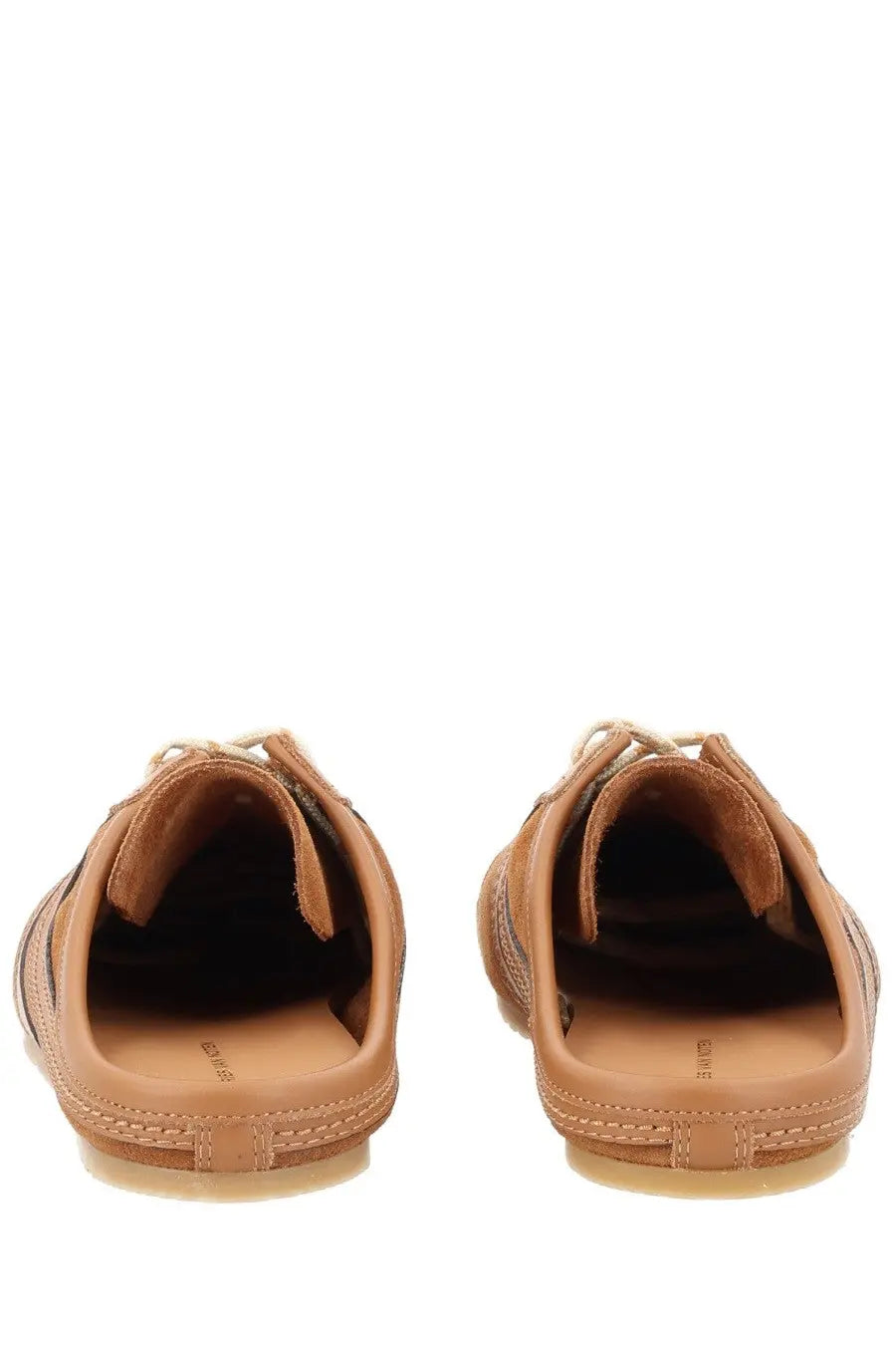 Dries Van Noten women’s slip on sneaker in brown tan leather with sleek minimalist design and subtle stitching details