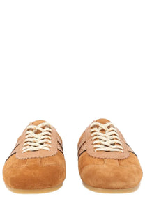 Dries Van Noten women’s slip on sneaker in tan suede with cream laces and dark brown stripes