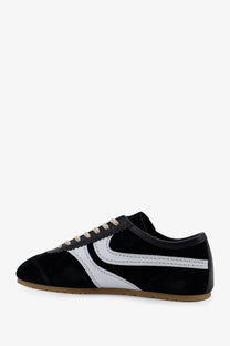 Dries van Noten women’s black suede sneakers with bold white swoosh and beige laces for stylish casual wear