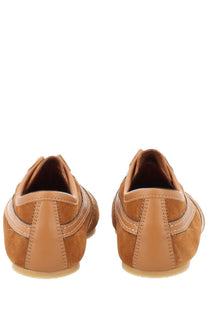 Dries Van Noten women’s low-top sneakers in tan suede and leather with a classic minimalist design