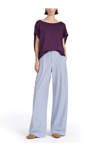 Dries Van Noten women’s light blue wide leg pants with subtle vertical stripes for a stylish look