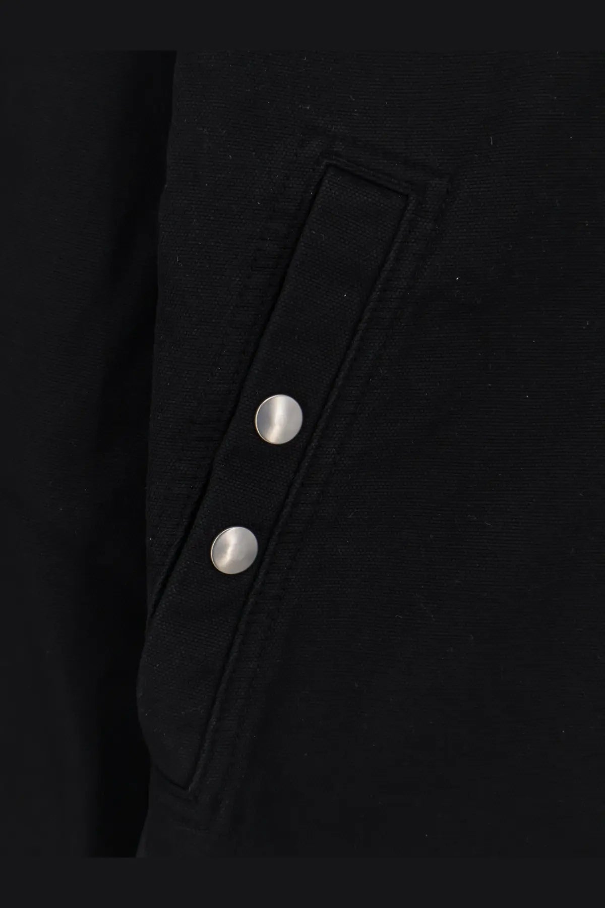 Drkshdw men’s black denim jacket with black fabric and two silver buttons on a flap pocket